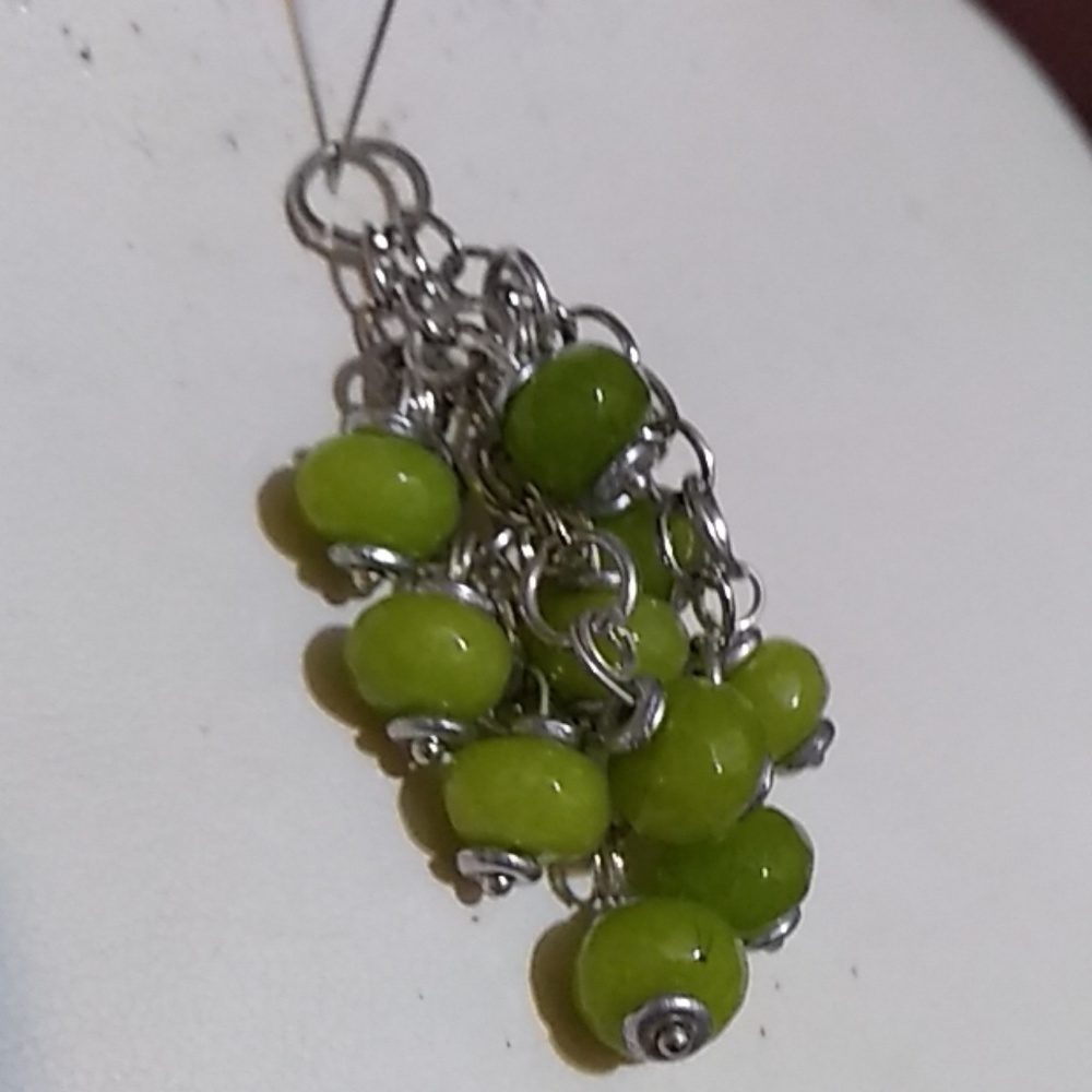 Peridot 3 strand charm necklace.